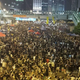 Image for article titled Amazing aerial photo of Hong Kong streets flooded with people
